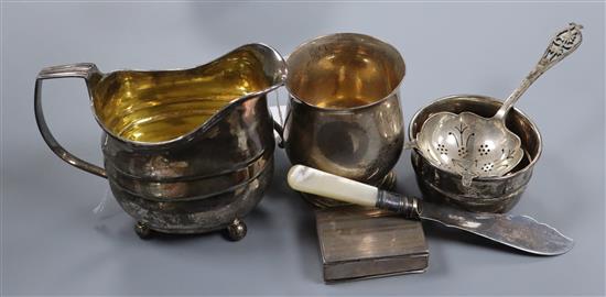 A George III silver cream jug and five other items,